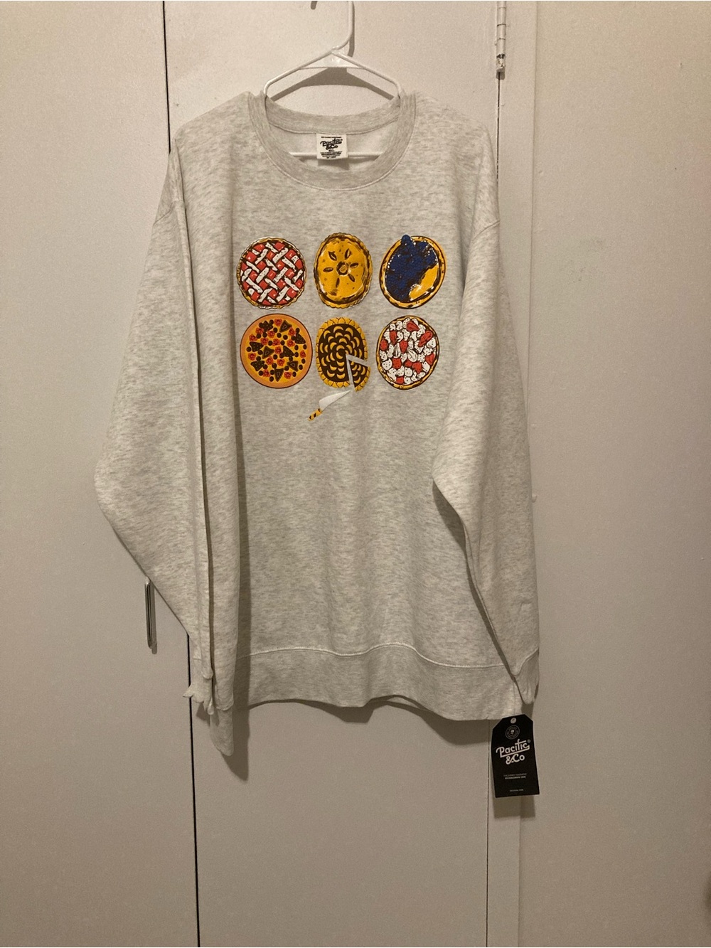 Pacifica Cream Crewneck Sweatshirt with Colorful Pie Graphic